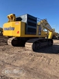 Back of used Excavator,Used Komatsu,Side of used Komatsu Excavator,Used Komatsu under sun,Side of used Excavator